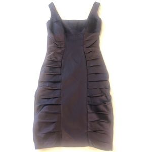 Deep purple gorgeous size 2 form fitting and body shaping fully lined dress